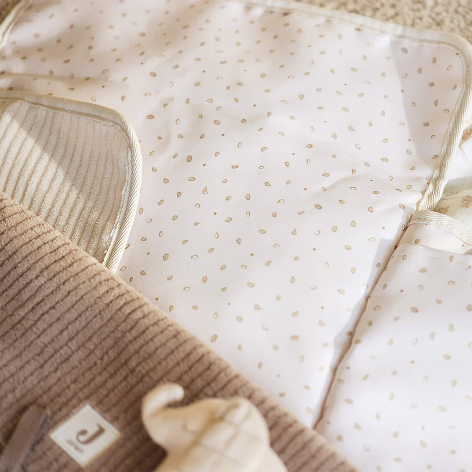Avis Matelas à Langer Nomade Cloudy Rib - Milky Coffee